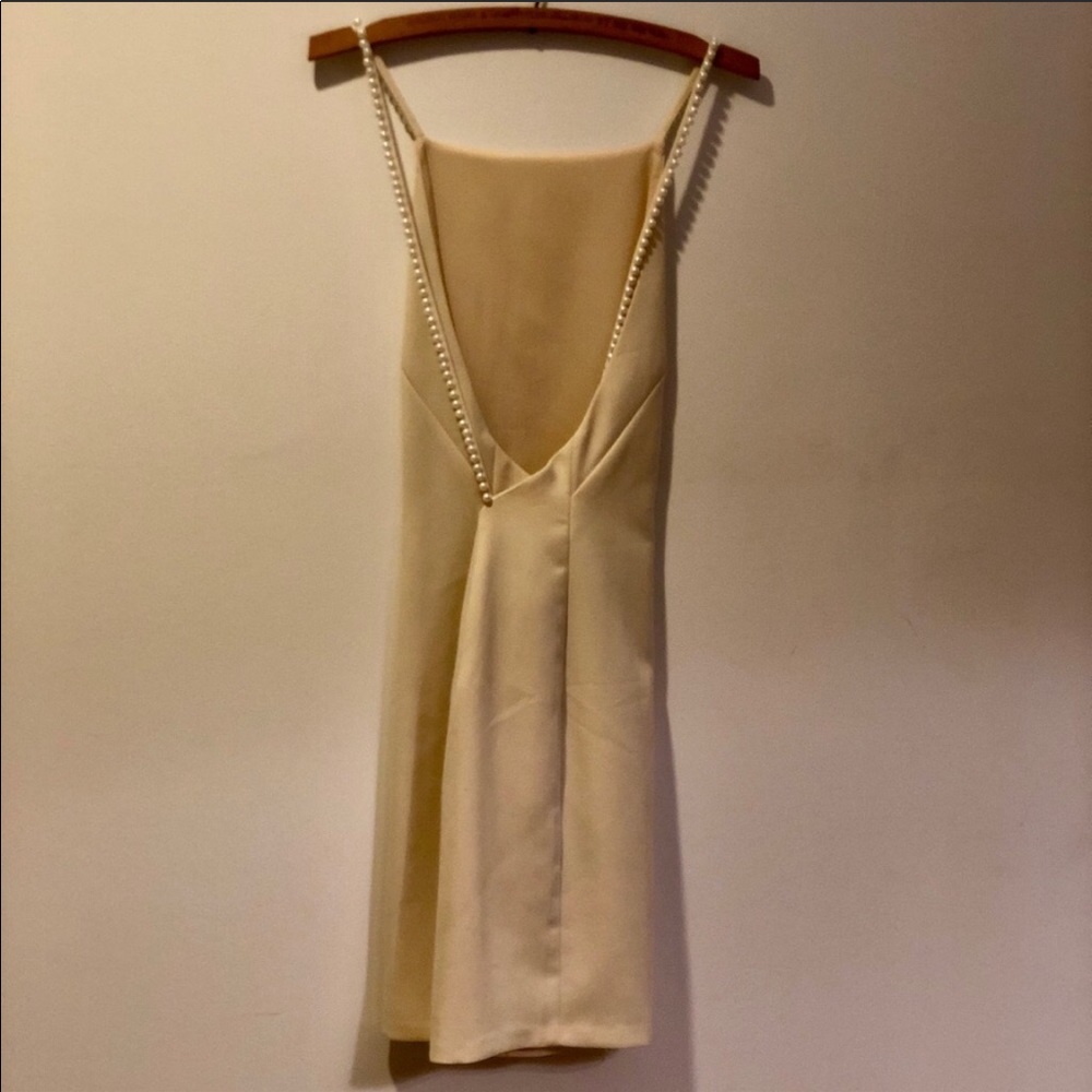 Beautiful open back pearl cream dress
